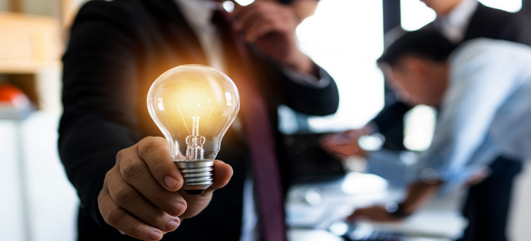 a-man-is-holding-the-bulb-to-show-how-to-be-innovative