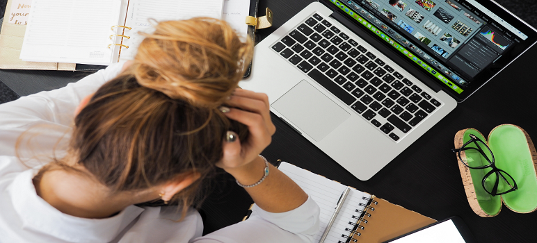 women-trying-to-manage-stress-at-workplace