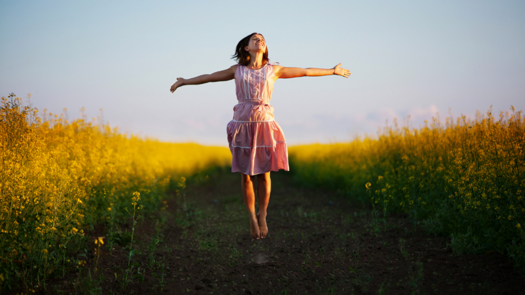 young-lady-showing-happiness-in-a-farmland