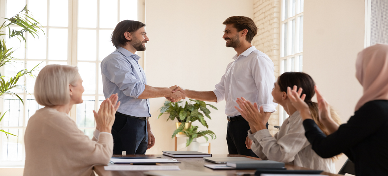 people-congratulating-each-other-on-employee-promotion-announcement